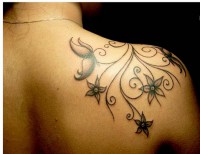/album/tattoo-chica/tatuaje-de-enredaderas-espalda-copia-2-jpg/